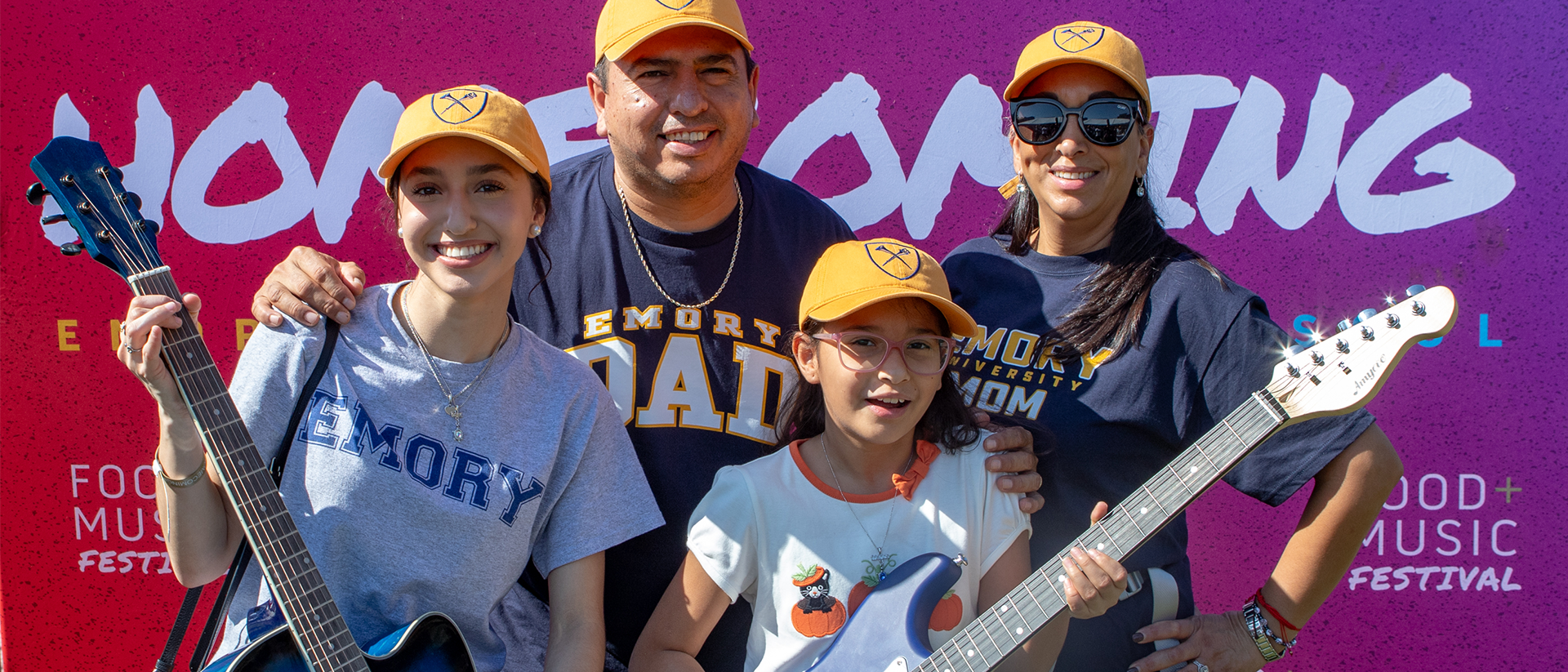 family wearing Emory swag